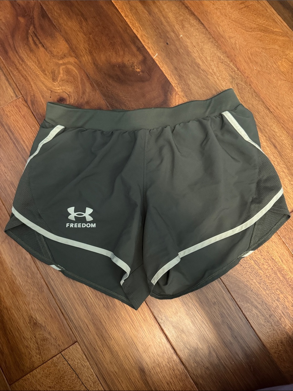 Under Armour Freedom Women's Olive Green Running Shorts with Reflective Trim